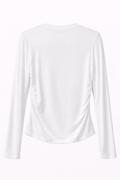 Blusa blanca manga larga detalle al lado
