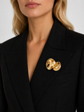 Broche dorado infinito