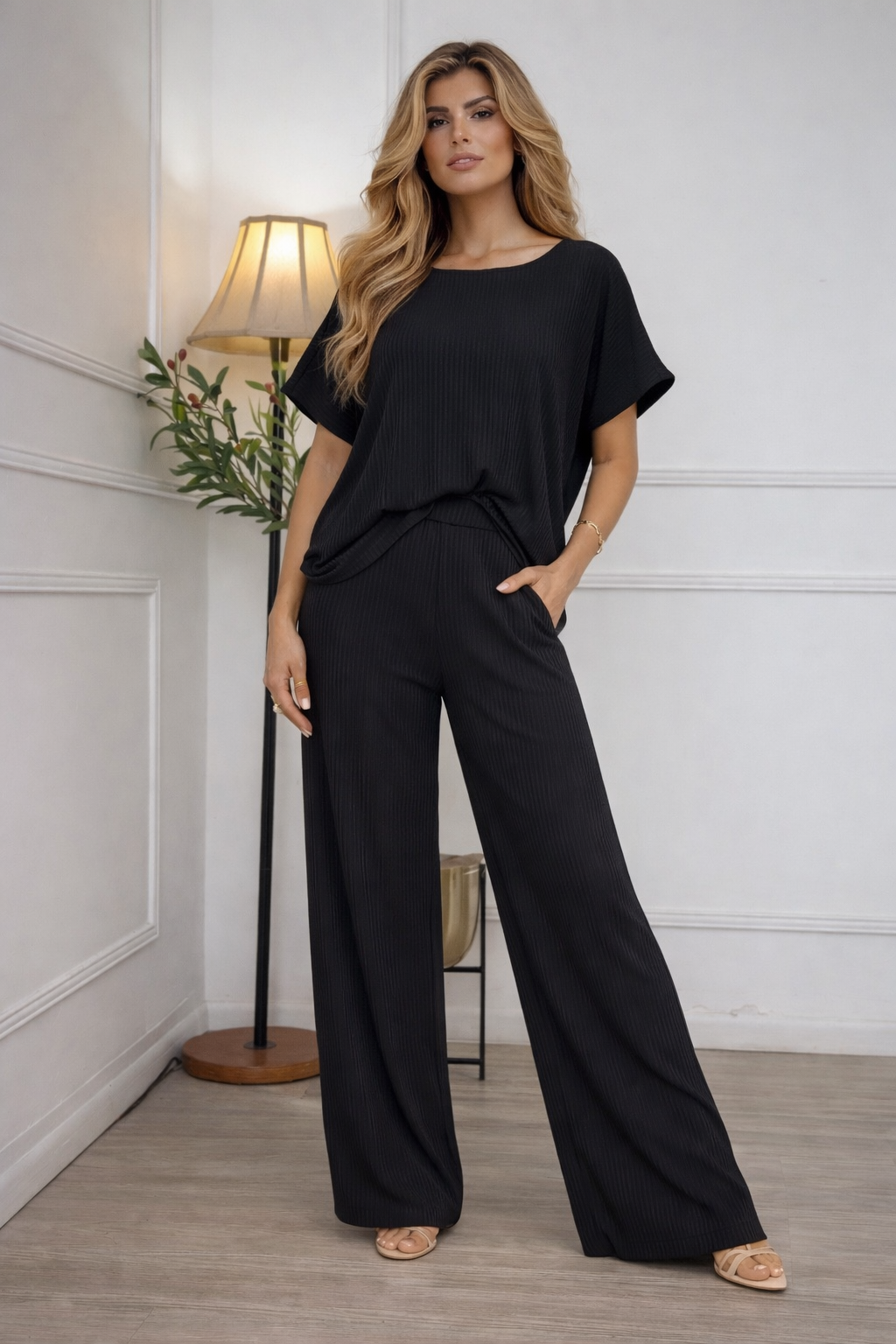 Set negro de blusa y pantalón  punto rayado
