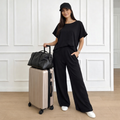 Set negro de blusa y pantalón  punto rayado