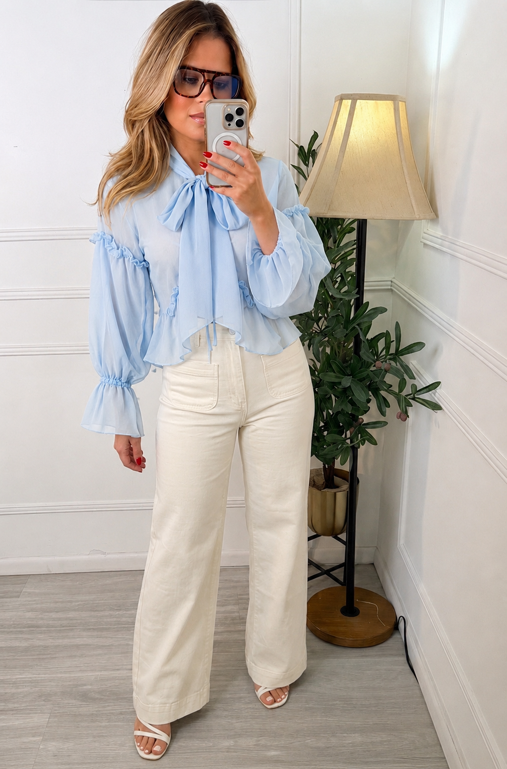 Blusa Celeste abierta manga larga con cordón