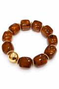 Brazalete café con detalles de acero inexorable