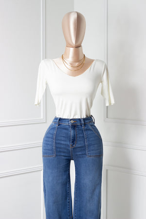 Blusa blanca básica manga tres cuartos