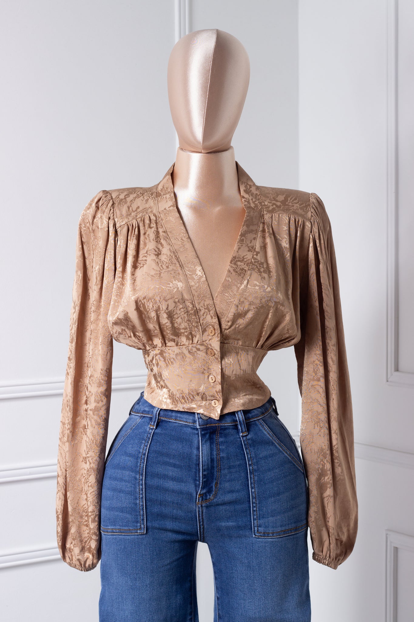 Blusa dorada manga larga