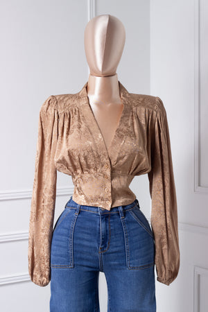 Blusa dorada manga larga