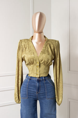 Blusa verde con hombreras